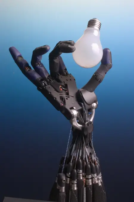 Shadow Dexterous Robot Hand holding a lightbulb